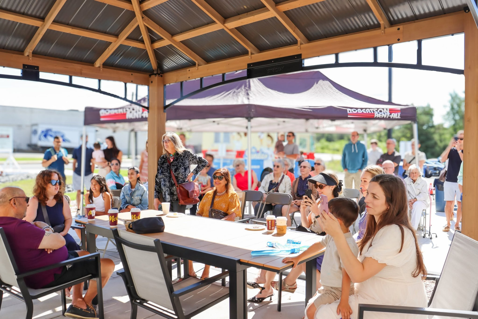 Residents and guests gathered under the gazebo at the Kemptville Lifestyles grand opening
